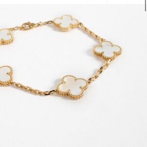 Elegant Gold and Cream Clover Bracelet